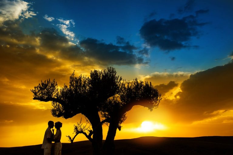 sunset couple in desert
