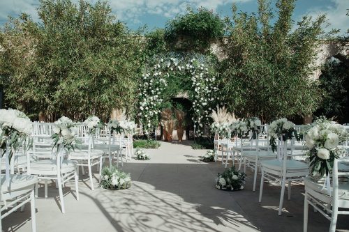 white flowers arch